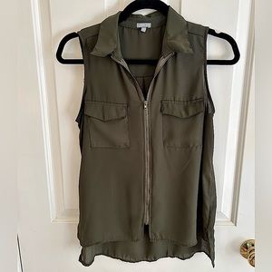 Green sleeveless blouse